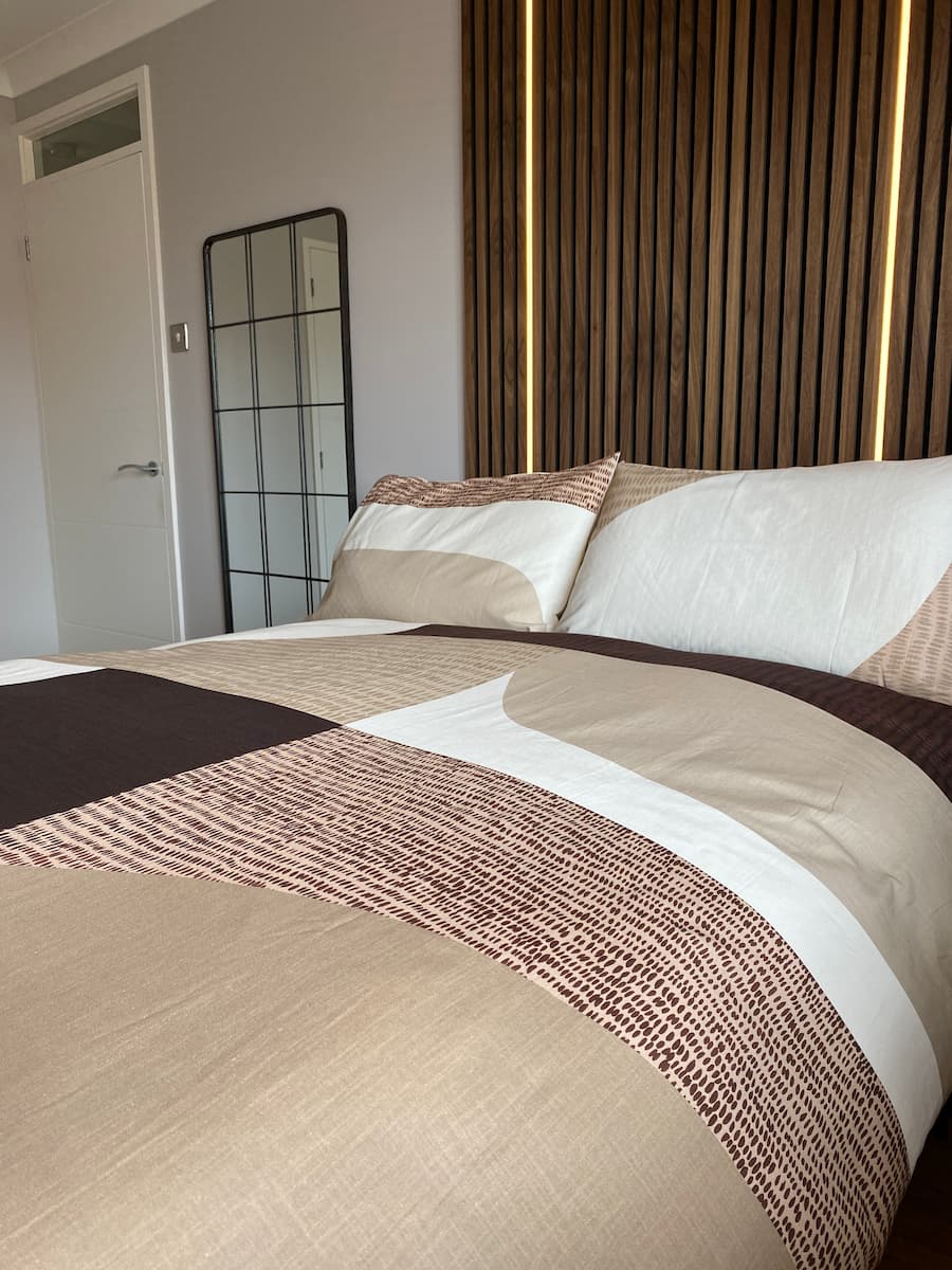 close up of the bold geometric bedding in a warm neutrals colour palette