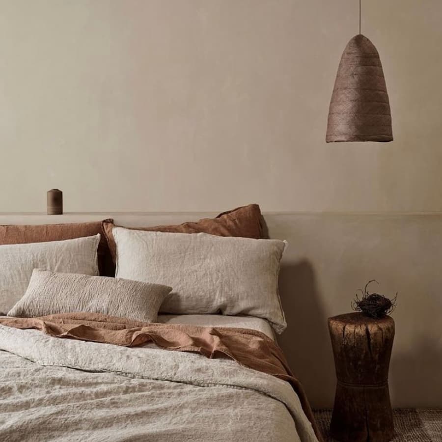 bedroom styled in various tones of soft browns and neutral tones