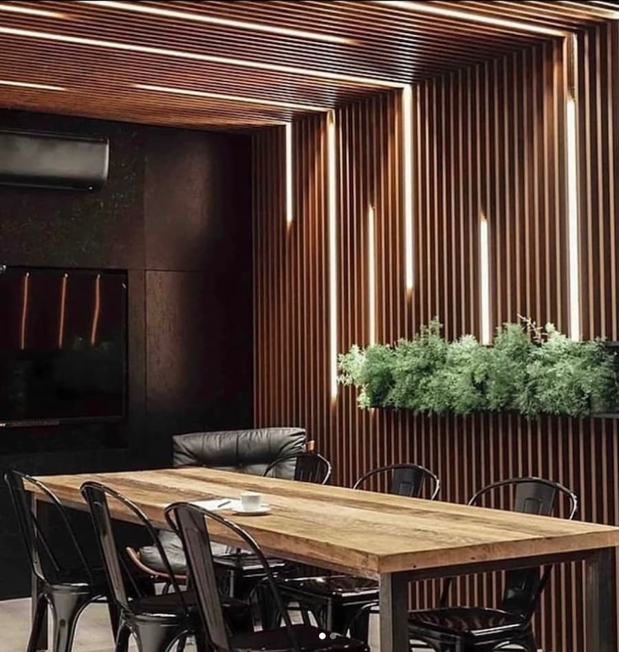 wood panelled feature wall and ceiling with lights