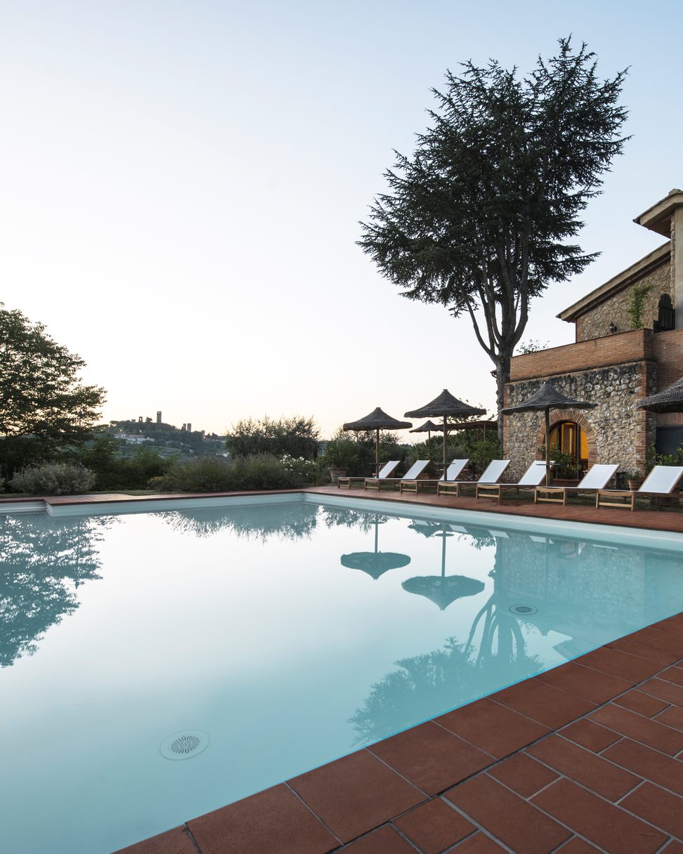 Swimming pool at I Pini overlooking the Tuscan town of San Gimignano
